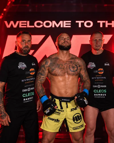 Fighter and team at an event