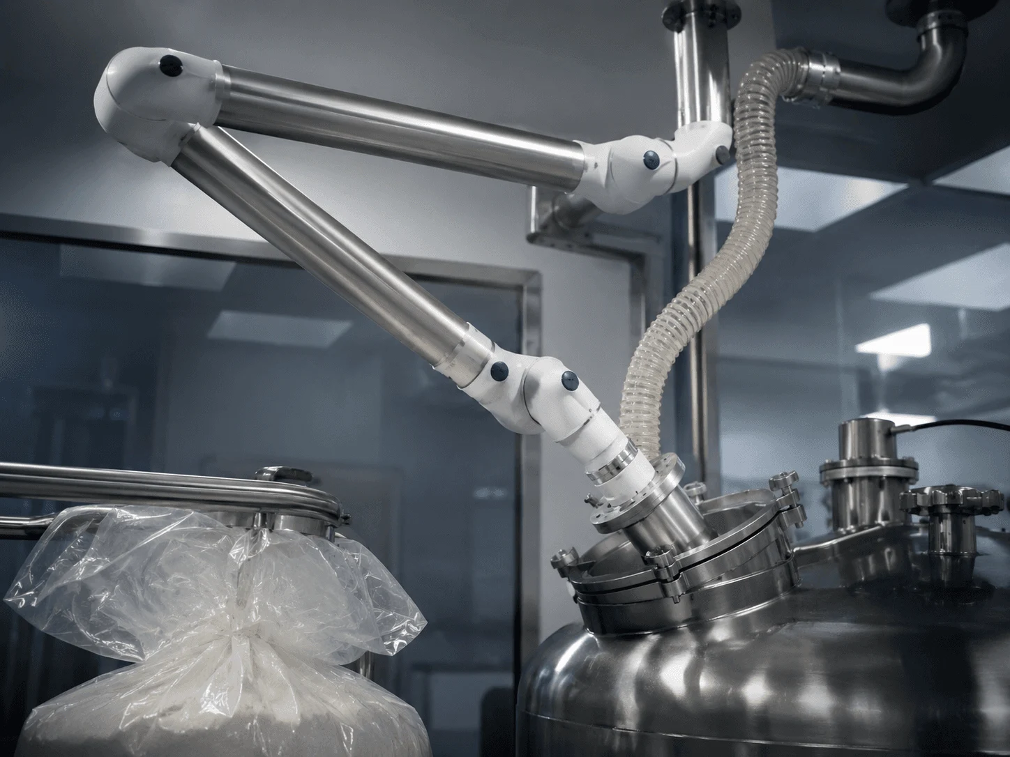 Close-up of raw material transfer equipment in the manufacturing facility