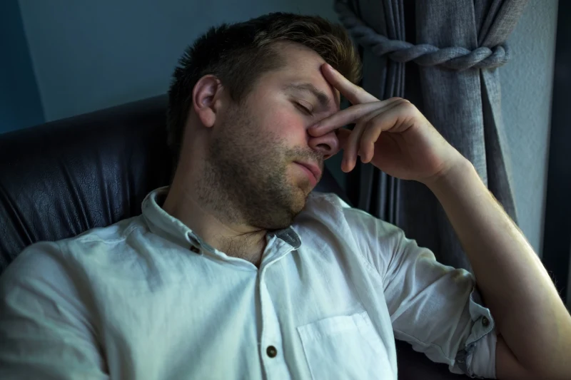 Man resting during a journey